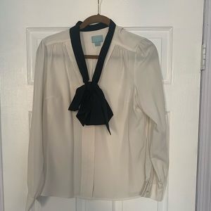 White blouse black tie bow